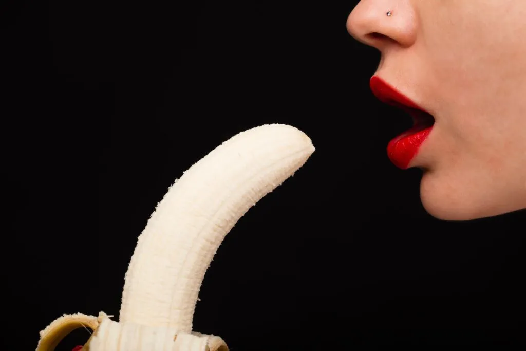 Woman Eating Banana